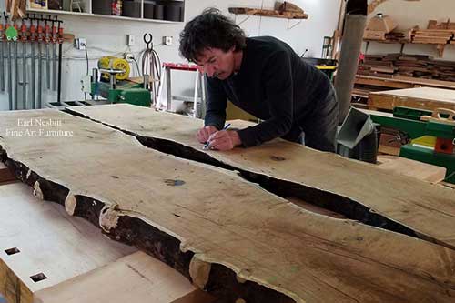 Earl marking notch on mesquite slabs for glass for custom made live edge dining table
